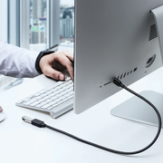 UGREEN 30125 0.5m USB 3.0 extension cable connected to a computer