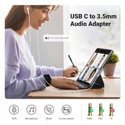 UGREEN 20194 right-angle USB-C to 3.5mm adapter USB-C to 3.5mm audio adapter used with a tablet