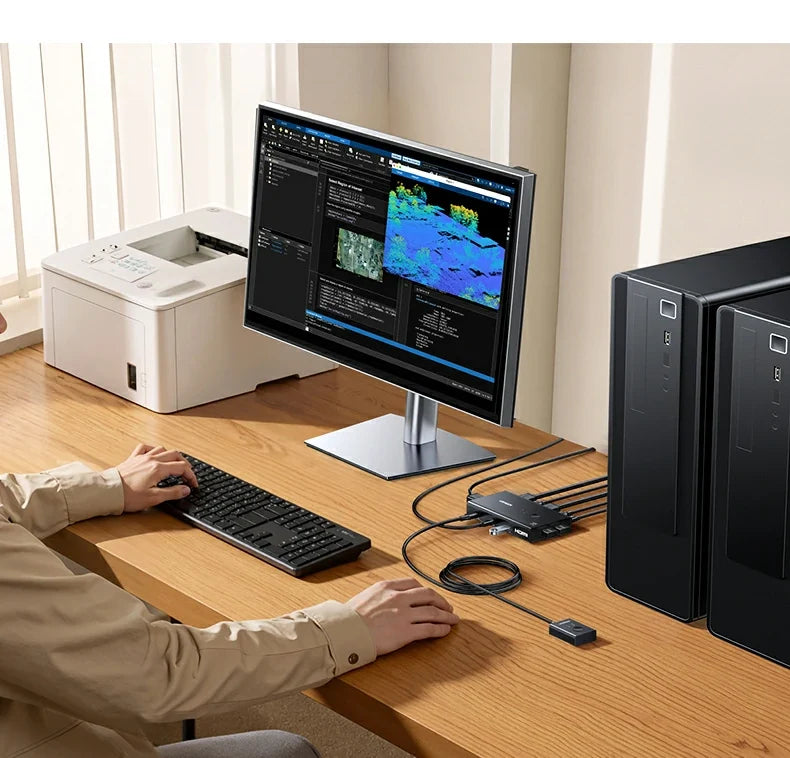 UGREEN AK502 sharing USB accessories between a laptop and desktop